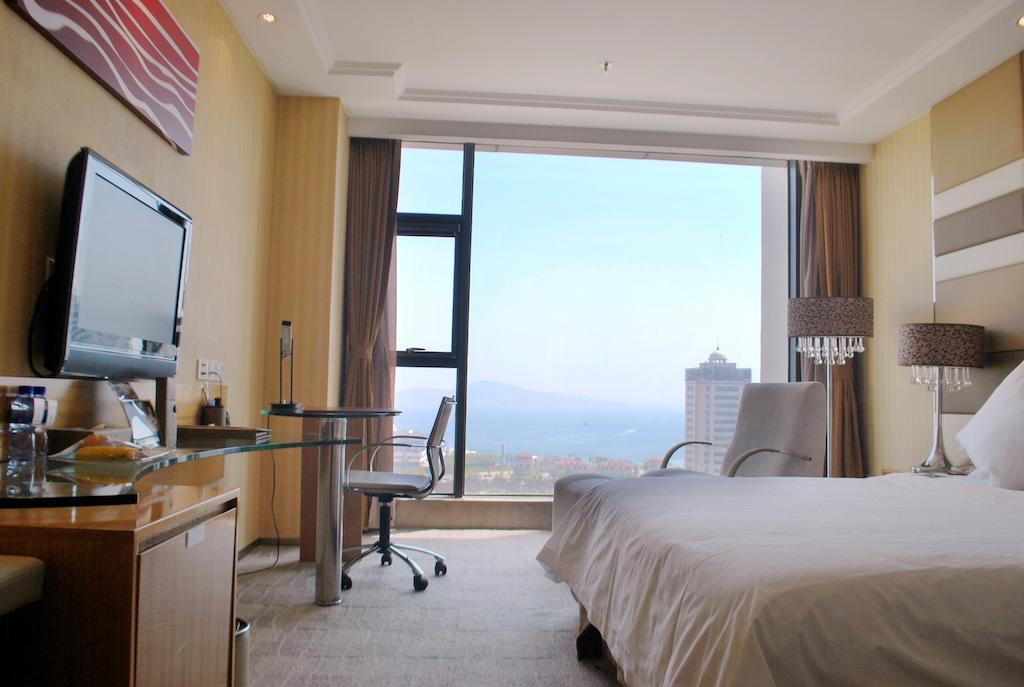 The Center Hotel Weihai Chambre photo